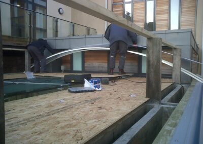 First Sun Modul panel being fitted to the first and second steel glazing channels