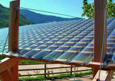 Single skin polycarbonate click together panels on a large timber cantilevered structure